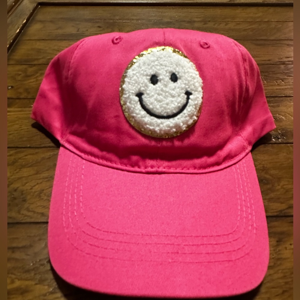 Cute on the go ball cap with adjustable back strap.